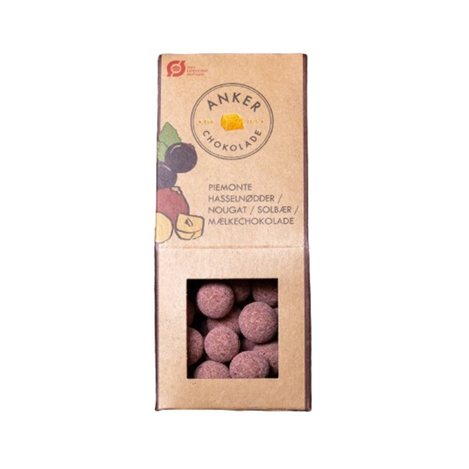 Dragee - Piemonte hasselnødder med nougat - Solbær - Mælkechokolade - Anker Chokolade