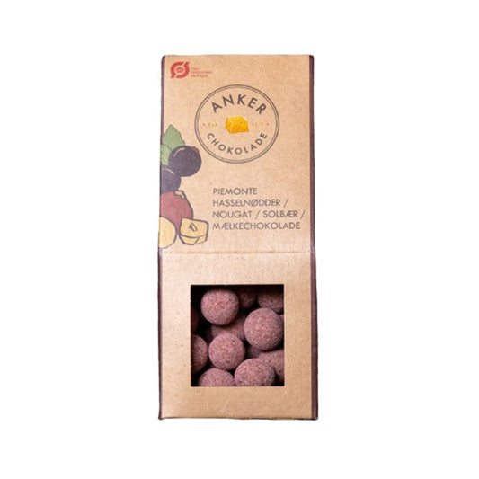 Dragee - Piemonte hasselnødder med nougat - Solbær - Mælkechokolade - Anker Chokolade